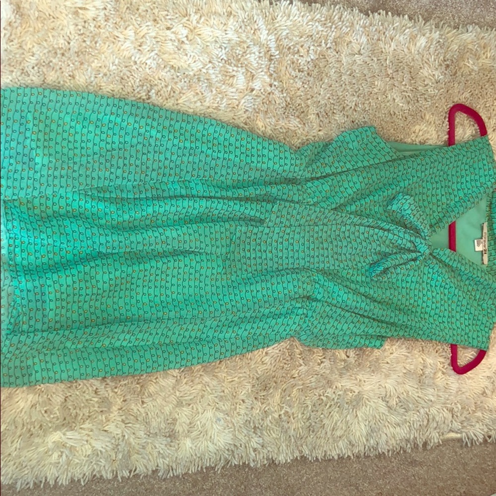 Turquoise mini dress with spiral pattern